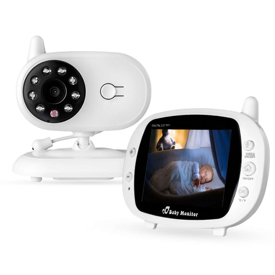 White baby monitor system with a camera and screen. The screen shows a sleeping baby. The design is compact and features buttons for video and power control.