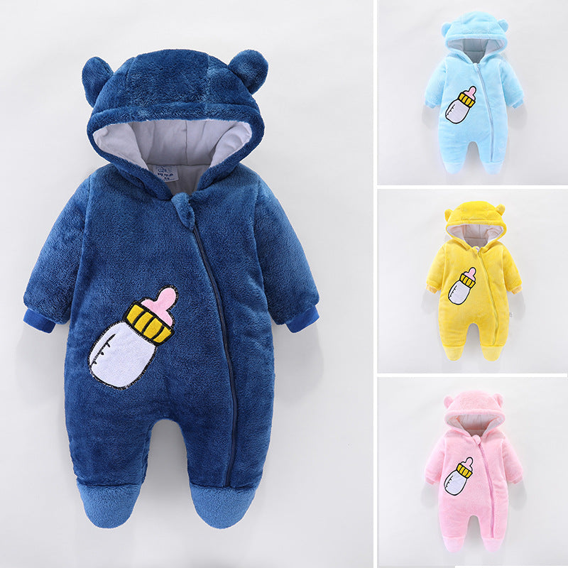 Three baby onesies in blue, yellow, and pink with ear hoods, each featuring a milk bottle design. The main focus is the blue onesie, displayed prominently.