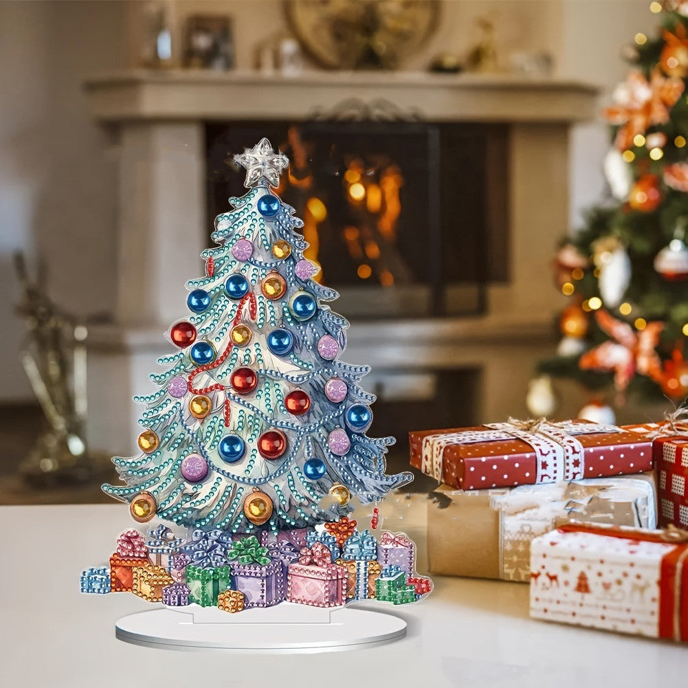 A festive room with a colorful, decorated tabletop Christmas tree surrounded by vibrant gift boxes. A fireplace glows warmly in the background.