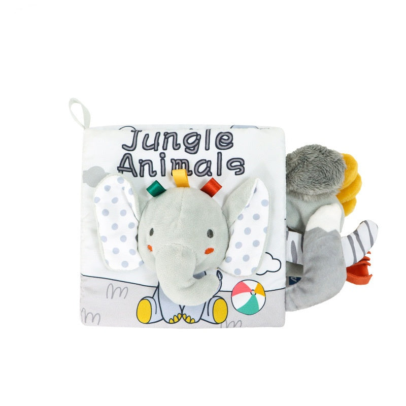 Cloth baby book titled "Jungle Animals" featuring a plush elephant face with colorful tags and polka-dotted ears. Additional soft fabric elements extend from the sides.