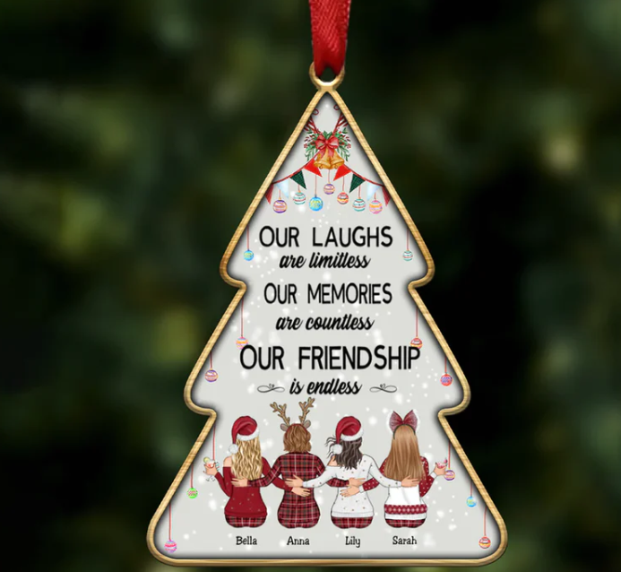 Tree-shaped ornament with the quote "Our laughs are limitless, our memories are countless, our friendship is endless" above four friends in festive attire, names below: Bella, Anna, Lily, Sarah.