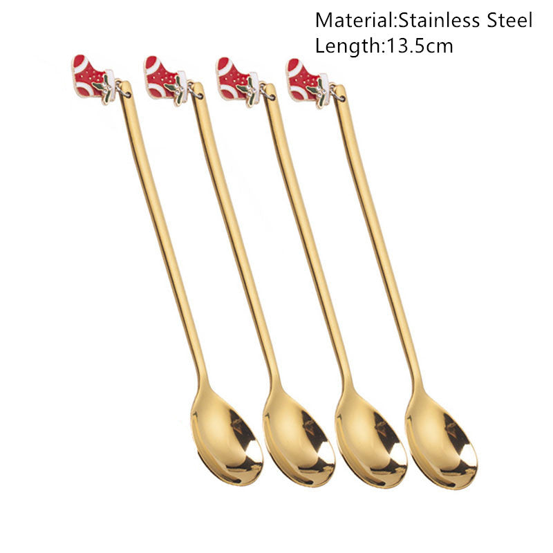 Four gold stainless steel spoons, each 13.5 cm long, featuring red Christmas stocking designs on the handles.