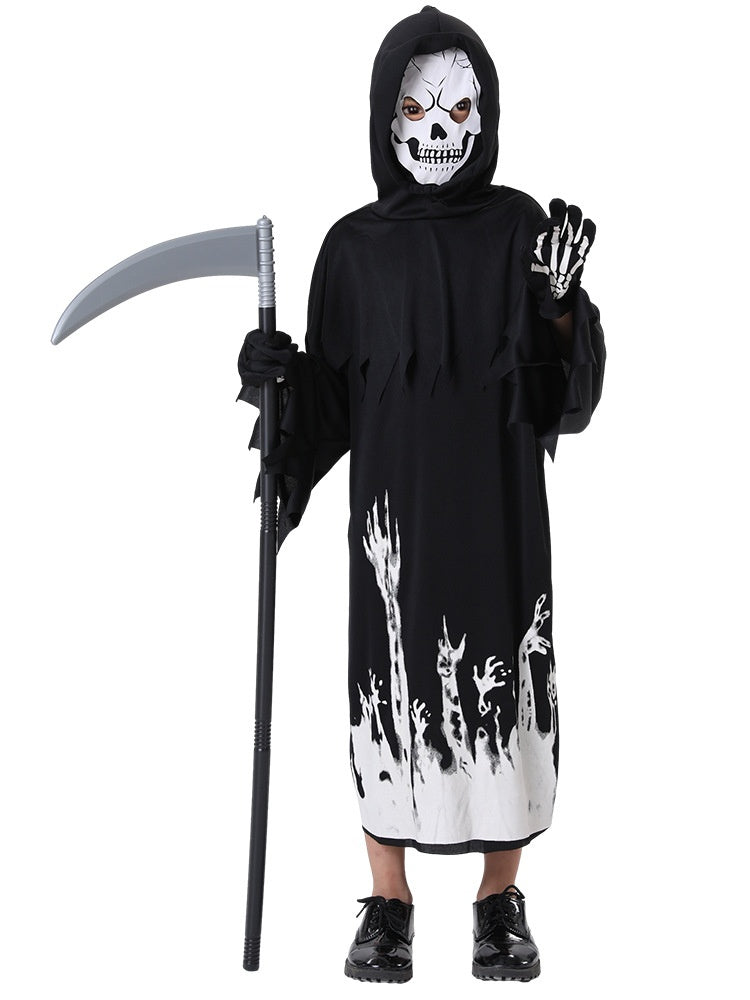 Child in a black grim reaper costume with a hooded robe, skeleton mask, and gloves, holding a scythe. The robe features white ghostly hands reaching upward across the hem.