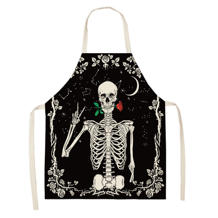 Apron featuring a skeleton with a rose in its mouth, making a peace sign. The design is set against a starry night sky with a crescent moon and floral border.