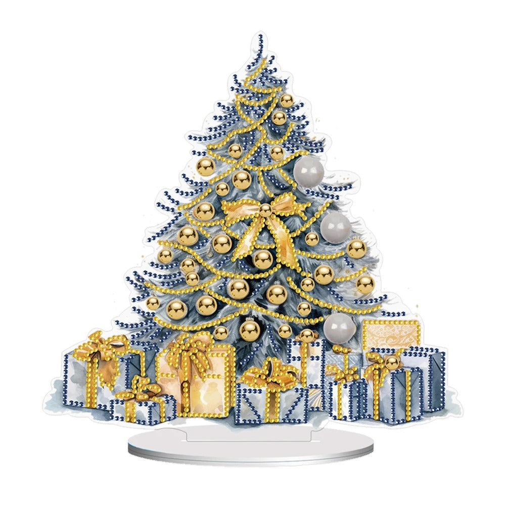 A festive Christmas tree decorated with gold and silver ornaments and ribbons. Below, blue and gold wrapped presents are placed in a neat arrangement.