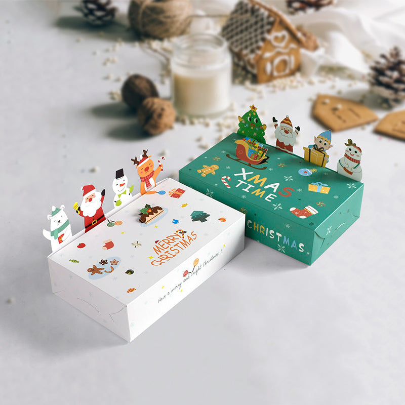 Festive green and white gift boxes with "Merry Christmas" and "Xmas Time" designs, featuring cartoon characters like Santa and reindeer, set on a winter-themed background.