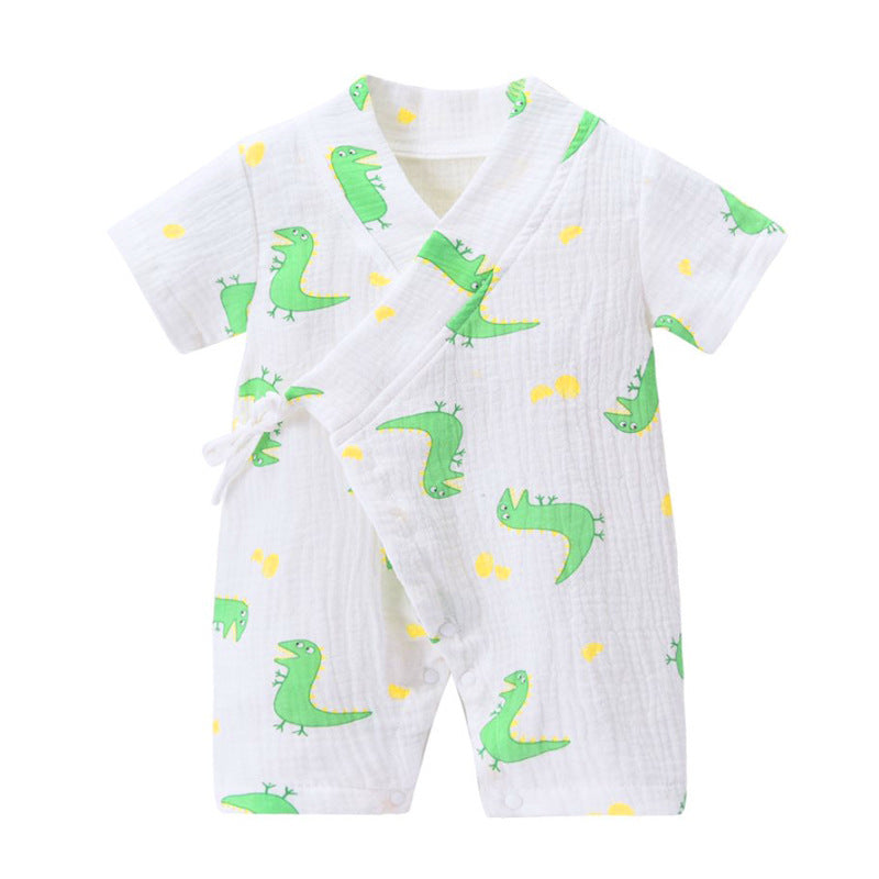 White baby romper with green dinosaur print and yellow polka dots, featuring short sleeves and a wrap-around tie design.