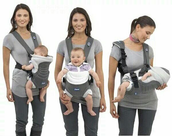 Three women demonstrate different ways to carry a baby in a carrier. Each holds a baby in a gray and white carrier, showcasing positions for front-facing, inward-facing, and side carry.