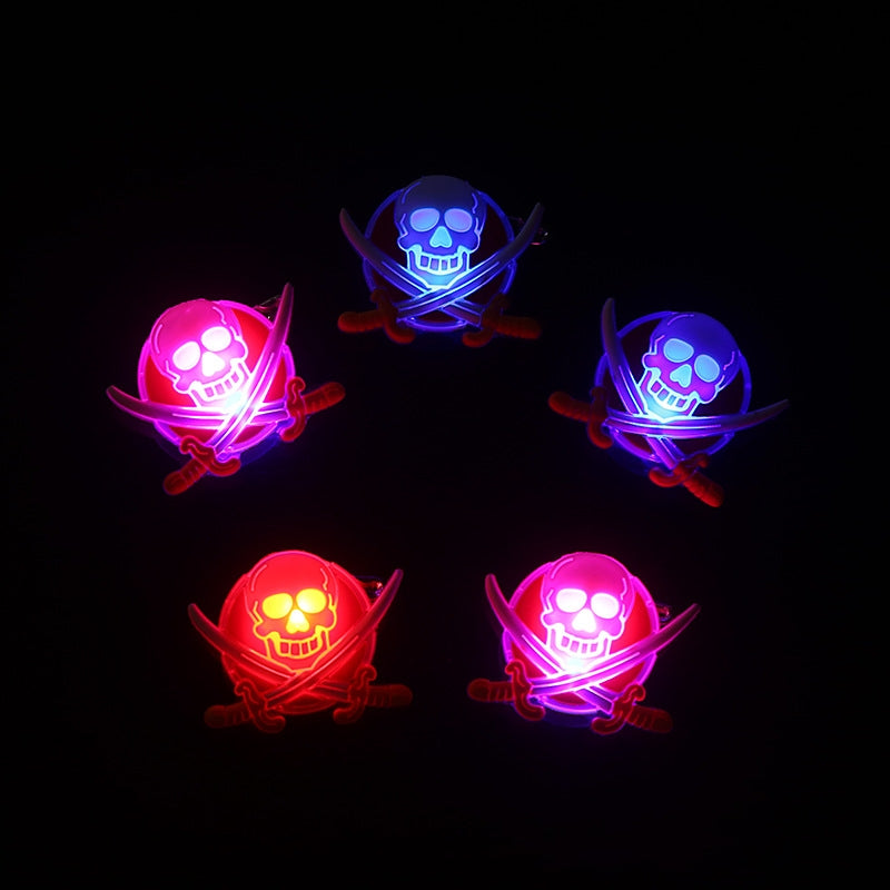 Five glowing skull emblems with crossed swords in red and blue form a pentagon on a black background, blending pirate iconography with neon aesthetics.