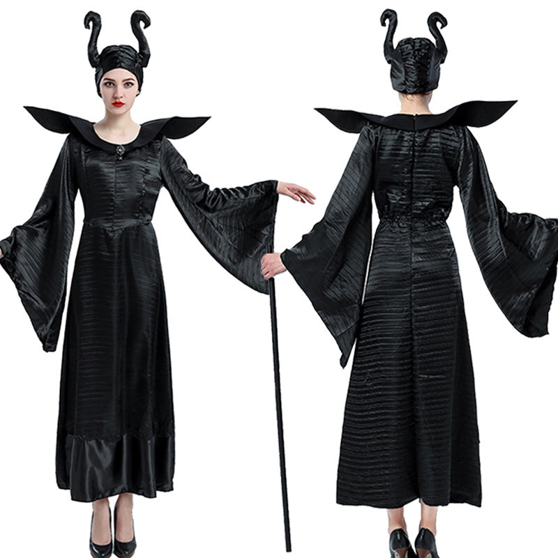 Person in a long black gown with wide sleeves, featuring pointed shoulder accents. They wear a headpiece with horn-like structures and hold a black staff, shown front and back.