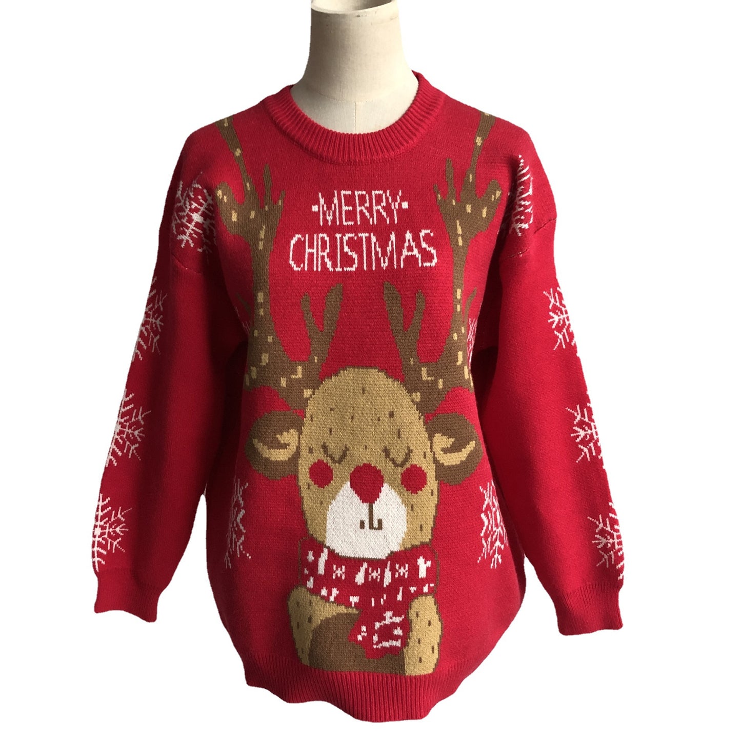 Red Christmas sweater with a reindeer design, wearing a scarf and printed with "Merry Christmas." Snowflakes decorate the sleeves, adding to the festive look.