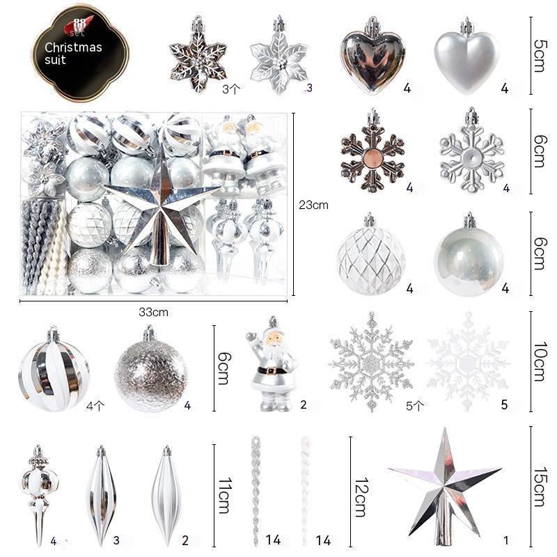 Assorted silver and white Christmas decorations including stars, snowflakes, hearts, balls, and Santa figures. Items vary in size, with a central boxed arrangement.