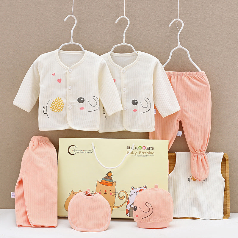 Two infant outfits on hangers, featuring white tops with cute animal faces, paired with peach pants. Includes matching hats and bibs, displayed with a Poby Fashion gift bag.