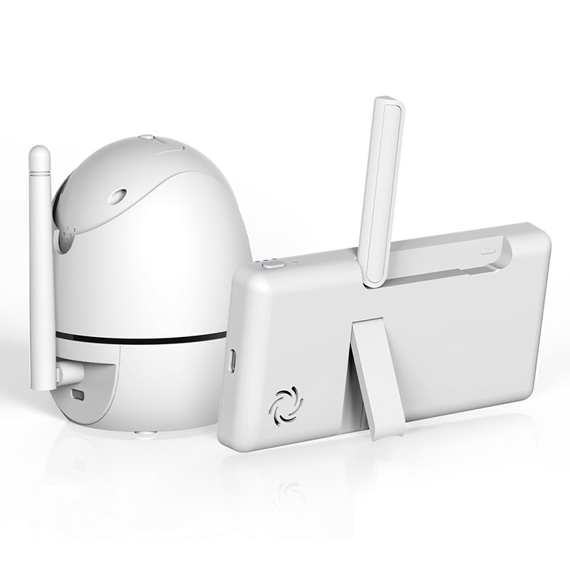 White baby monitor with a dome-shaped camera on the left and a rectangular screen with an antenna on the right, both placed on a glossy white surface.