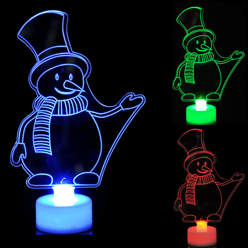 Three illuminated snowmen in blue, green, and red. Each has a top hat and scarf, standing on a glowing base against a black background.