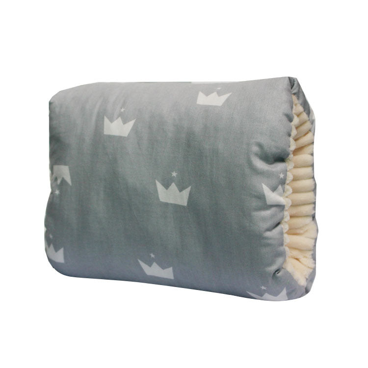 Gray diaper with a crown pattern folded neatly, showcasing its soft, plush material edging on one side, designed for comfort and style.