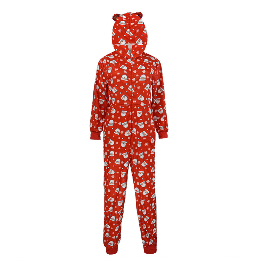 Red hooded onesie with a festive print of Santa faces and snowflakes. The hood features bear ears, and the onesie includes a front zipper and elastic cuffs.