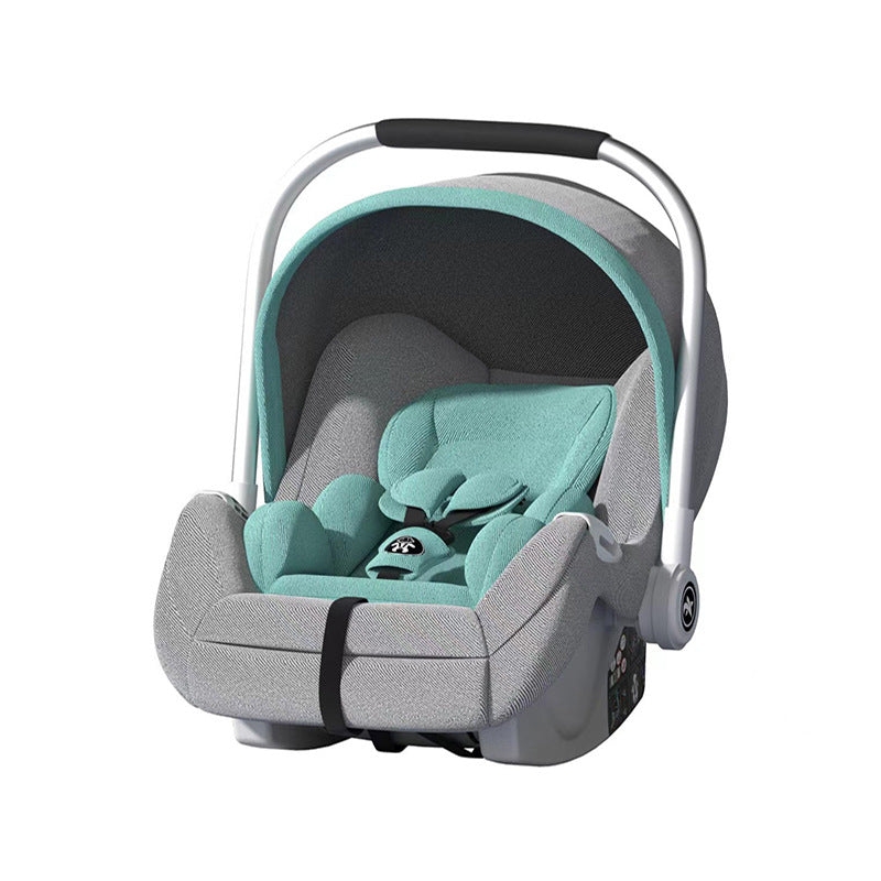 A green and gray infant car seat with a canopy and a black handle, featuring cushioned support and safety straps, designed for secure infant transportation.