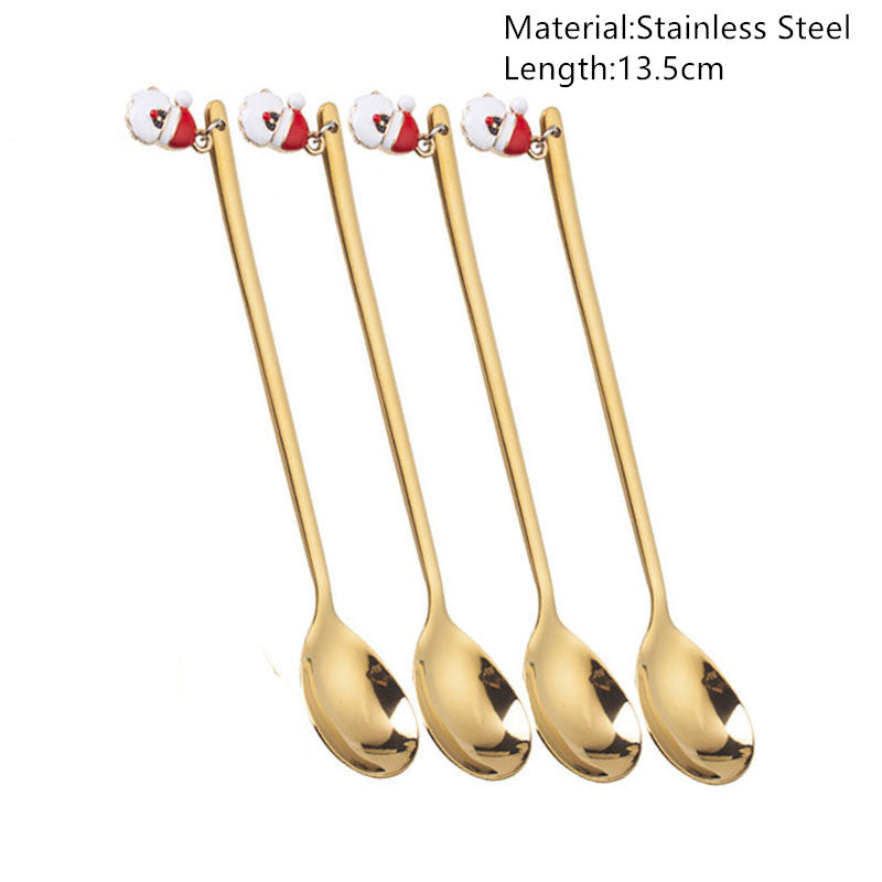 Four gold stainless steel coffee spoons, each 13.5cm long, featuring Santa hat decorations on their handles.