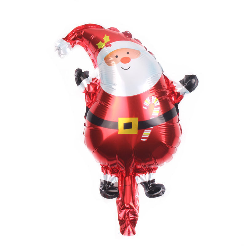 A shiny, red foil balloon shaped like Santa Claus, featuring his classic outfit with a candy cane detail, smiling face, and white beard against a white background.