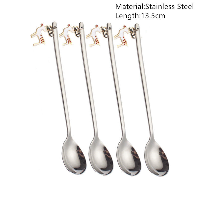 Four stainless steel spoons, each 13.5cm long, with decorative charms at the handle ends.