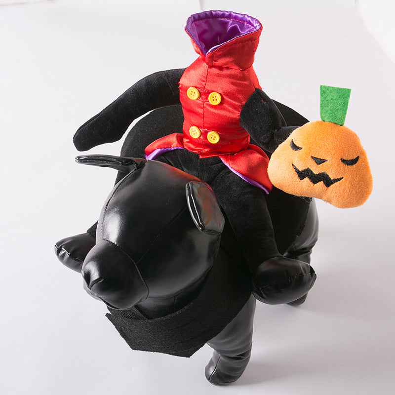 Black dog costume featuring a headless horseman in a red coat with yellow buttons, holding a plush orange pumpkin head with a green stem.