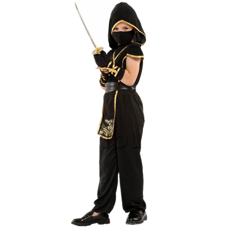 Child in a black and gold ninja costume holds a sword. The outfit includes a hood, mask, and belt with decorative details, embodying a traditional ninja look.