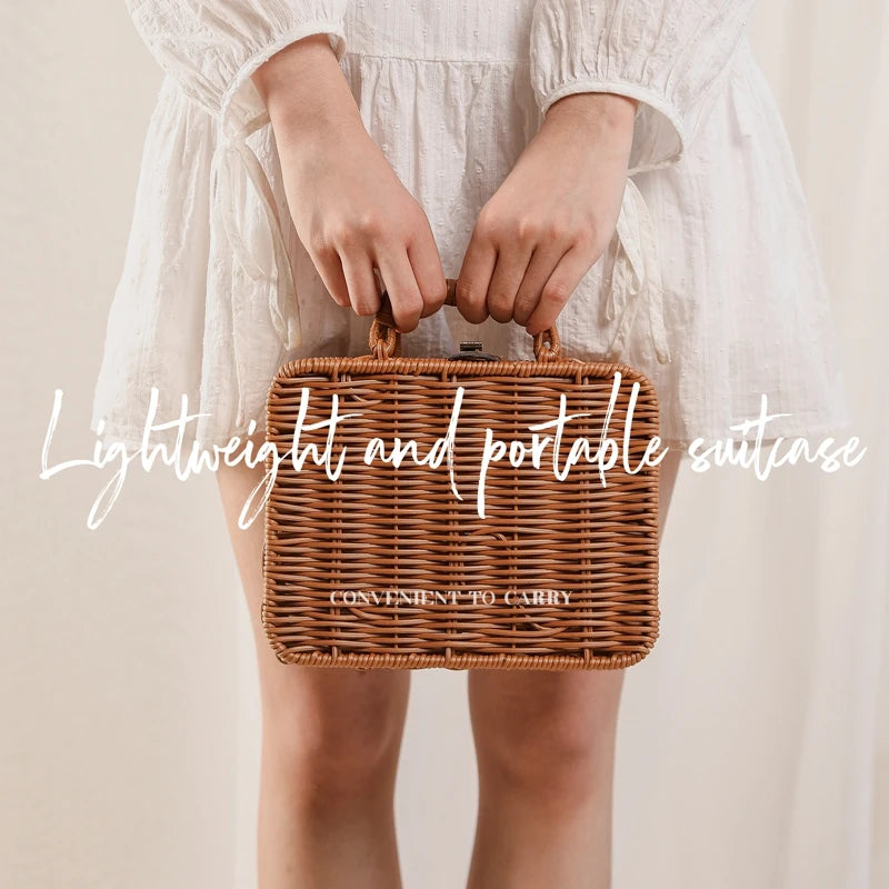 Woman in a white dress holding a small, wicker suitcase with "Lightweight and portable suitcase" text overlay. Hands clasp the suitcase handles, highlighting its convenience to carry.