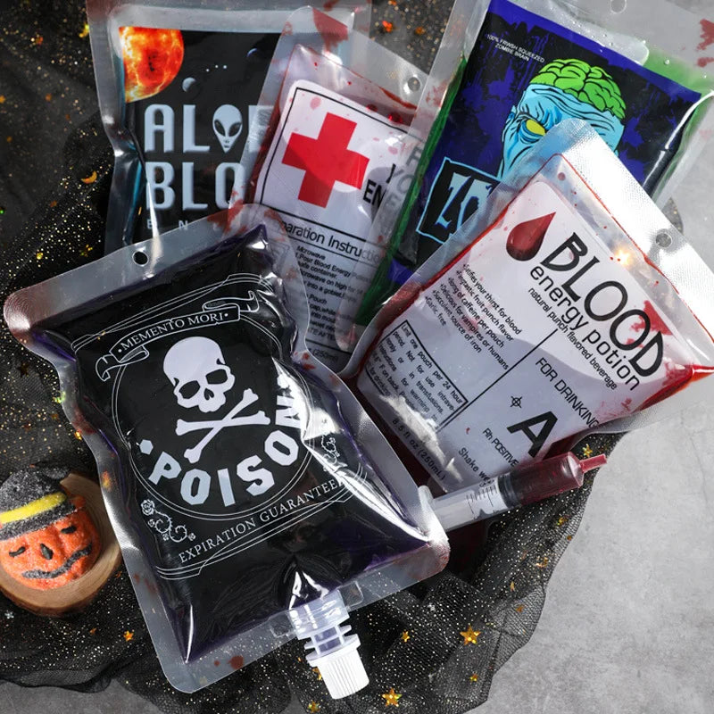Halloween-themed drink pouches resembling blood bags with labels like "Poison," "Blood Energy Potion," and "Alien Blood." A small pumpkin decoration is nearby.