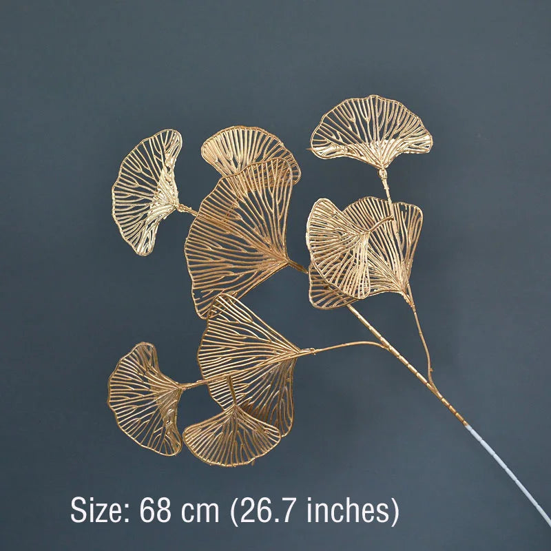 Golden wire leaves with a ginkgo shape against a dark gray background. The design is intricate and measures 68 cm (26.7 inches) in height.