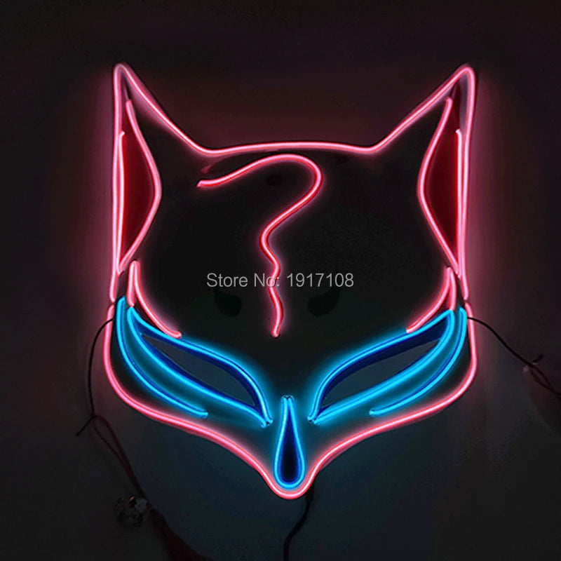 Neon sign shaped like a fox face in pink and blue lights. The design features large, stylized eyes and ears, with a whimsical, artistic flair.