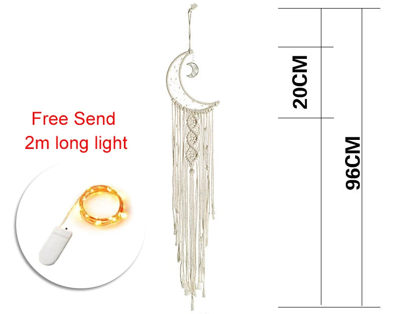 Crescent moon dreamcatcher with hanging tassels, measuring 96 cm by 20 cm. Includes a free 2-meter long LED light string, shown coiled next to a battery pack.