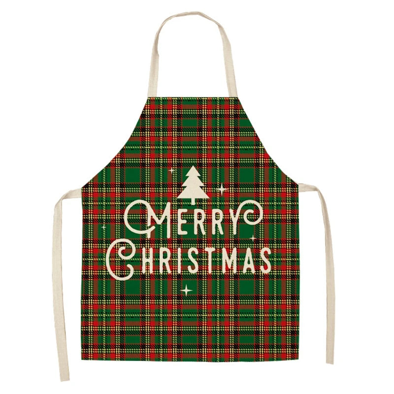 Festive apron with red and green plaid pattern, featuring the words "Merry Christmas" and a small tree graphic in white, along with beige neck and waist ties.