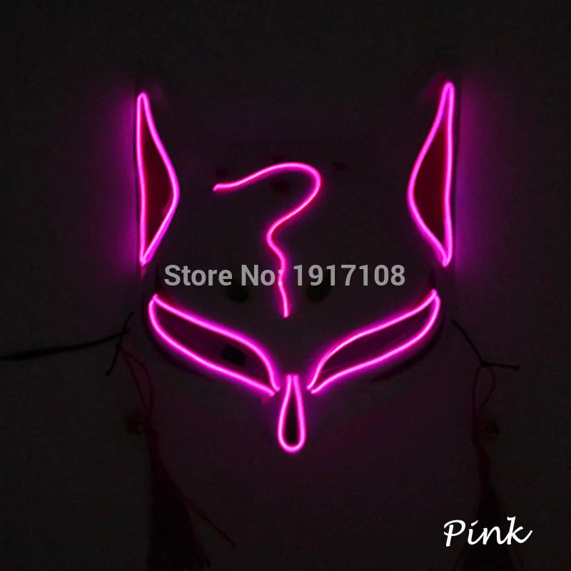 Glowing pink neon sign shaped like a stylized fox or cat face with pointy ears and mysterious eyes, set against a dark background. Text overlay says "Pink."
