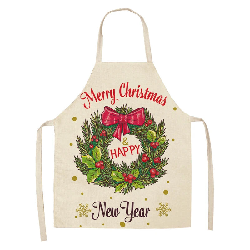 Christmas apron with a festive wreath design, featuring a red bow and holly leaves. The text "Merry Christmas" and "Happy New Year" is written in red and black script.