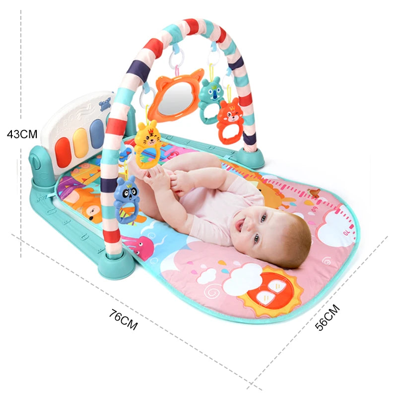 Baby on a colorful play mat with hanging animal toys and a keyboard. The mat measures 76cm by 56cm. The play arch is striped, and the baby is happily reaching for toys.