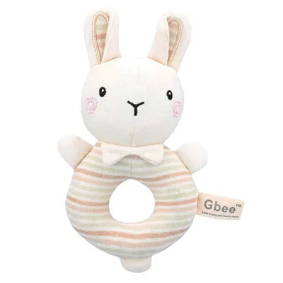 Plush bunny rattle with pink cheeks and a bowtie. The body is striped in soft pastel colors with a circular center. A tag reading "Gbee" is attached to the side.