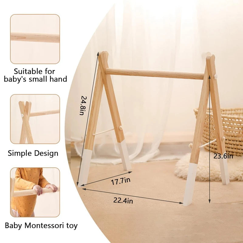 Wooden baby play gym with a simple design, measuring 24.8x23.6 inches. Suitable for small hands, features white-tipped legs, and is highlighted as a Montessori toy.