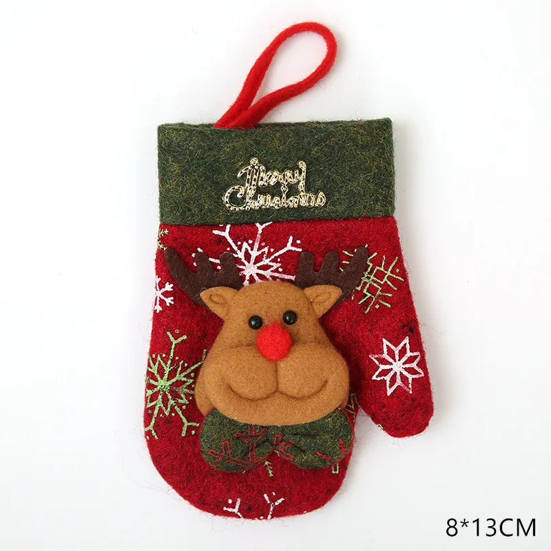 Red Christmas mitten with a green cuff, featuring a felt reindeer and snowflakes, with "Merry Christmas" text in gold. Dimensions 8x13 cm.