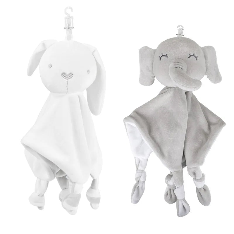 Two plush security blankets: a white rabbit with floppy ears and embroidered face, and a gray elephant with closed eyes and trunk. Both have knotted corners and are attached to clips.