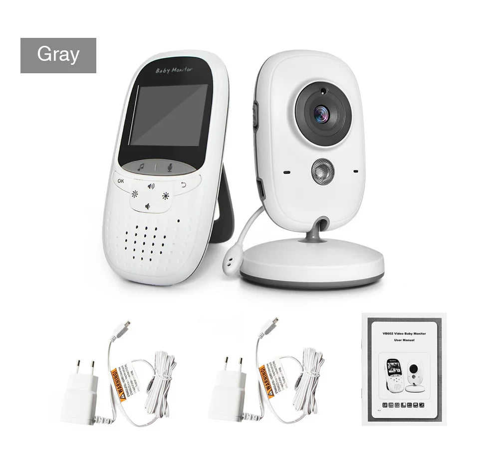 Gray baby monitor set with a handheld screen, a camera on a stand, two power adapters, and a user manual.