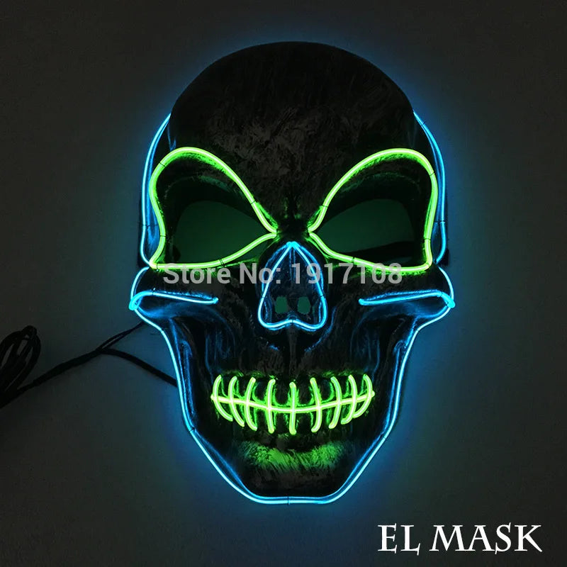 Glowing skull-shaped mask with neon blue and green accents, featuring large eye cutouts and a stylized stitched mouth. Text reads "EL MASK".