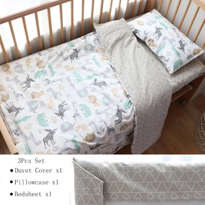 A children's bed with a forest-themed 3-piece bedding set featuring a duvet cover, pillowcase, and bedsheet. The pattern includes animals and geometric designs in soft colors.