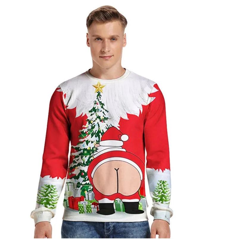 Man wearing a festive red Christmas sweater featuring Santa's back view with a humorous twist, standing in front of a decorated tree with gifts, on a white background.