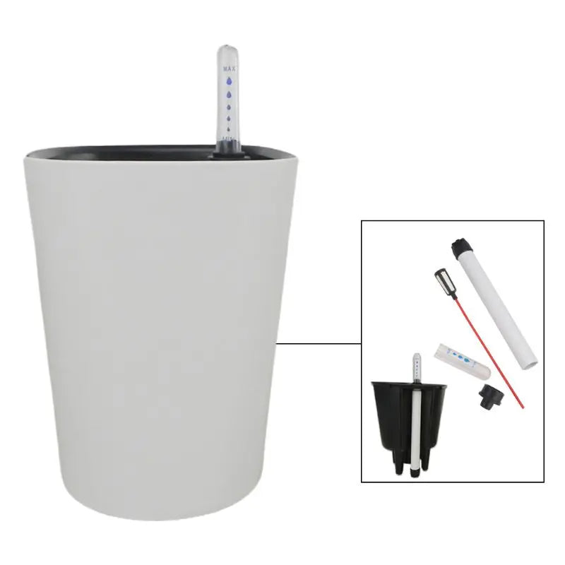 White self-watering planter with water level indicator. Inset shows components: an inner pot, water gauge, tube, and sticks for maintaining optimal plant moisture levels.