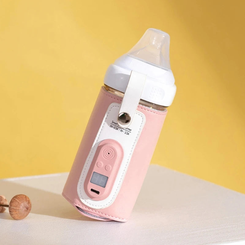A pink smart baby bottle warmer with a digital screen and buttons, set against a yellow background.