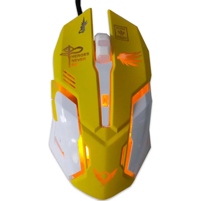 Bright yellow gaming mouse with orange LED lights and black cable. Features various decals, including a bird and the phrase "HEROES NEVER DIE," with a sleek, angular design.