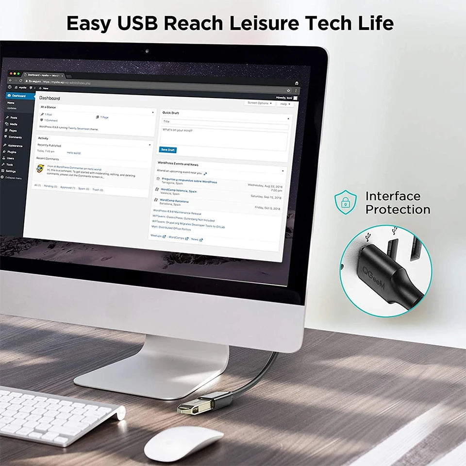 A desktop monitor displays a dashboard interface. Text reads "Easy USB Reach Leisure Tech Life." A close-up highlights a USB cable with "Interface Protection" label. Keyboard and mouse visible.