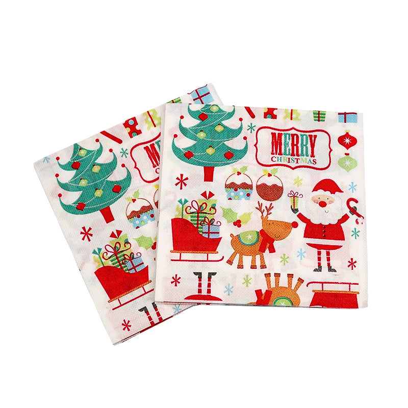 Festive Christmas napkins featuring Santa, reindeer, sleigh, gifts, Christmas trees, and snowflakes, with "Merry Christmas" text in red. Bright and colorful holiday design.