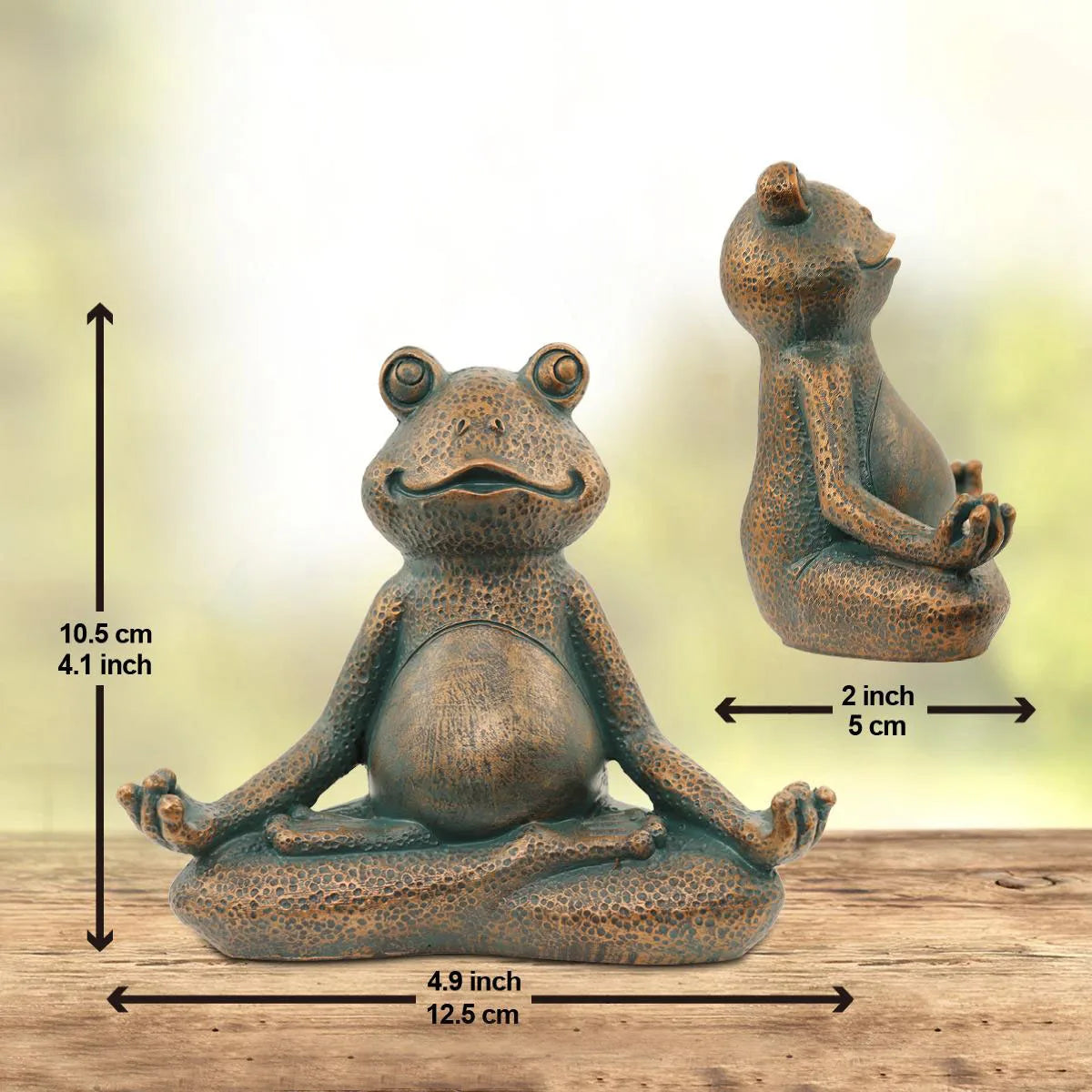 A sitting resin frog figurine in a meditative pose, featuring a textured surface. Dimensions: 10.5 cm tall, 12.5 cm wide, and 5 cm deep. Displayed on a wooden surface.